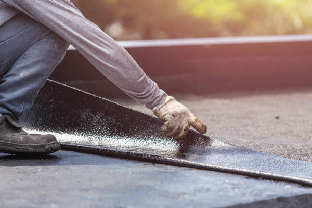 Professional Waterproofing technician working in Galesville, MD